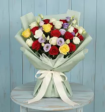Букет цветов из:  Розы в Северка