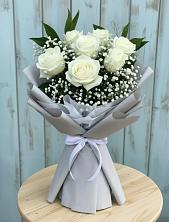 Букет цветов из:  Розы в Северка