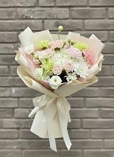 Букет цветов из:  Гвоздики, Розы, Лизиантусы и Хризантемы в Северка