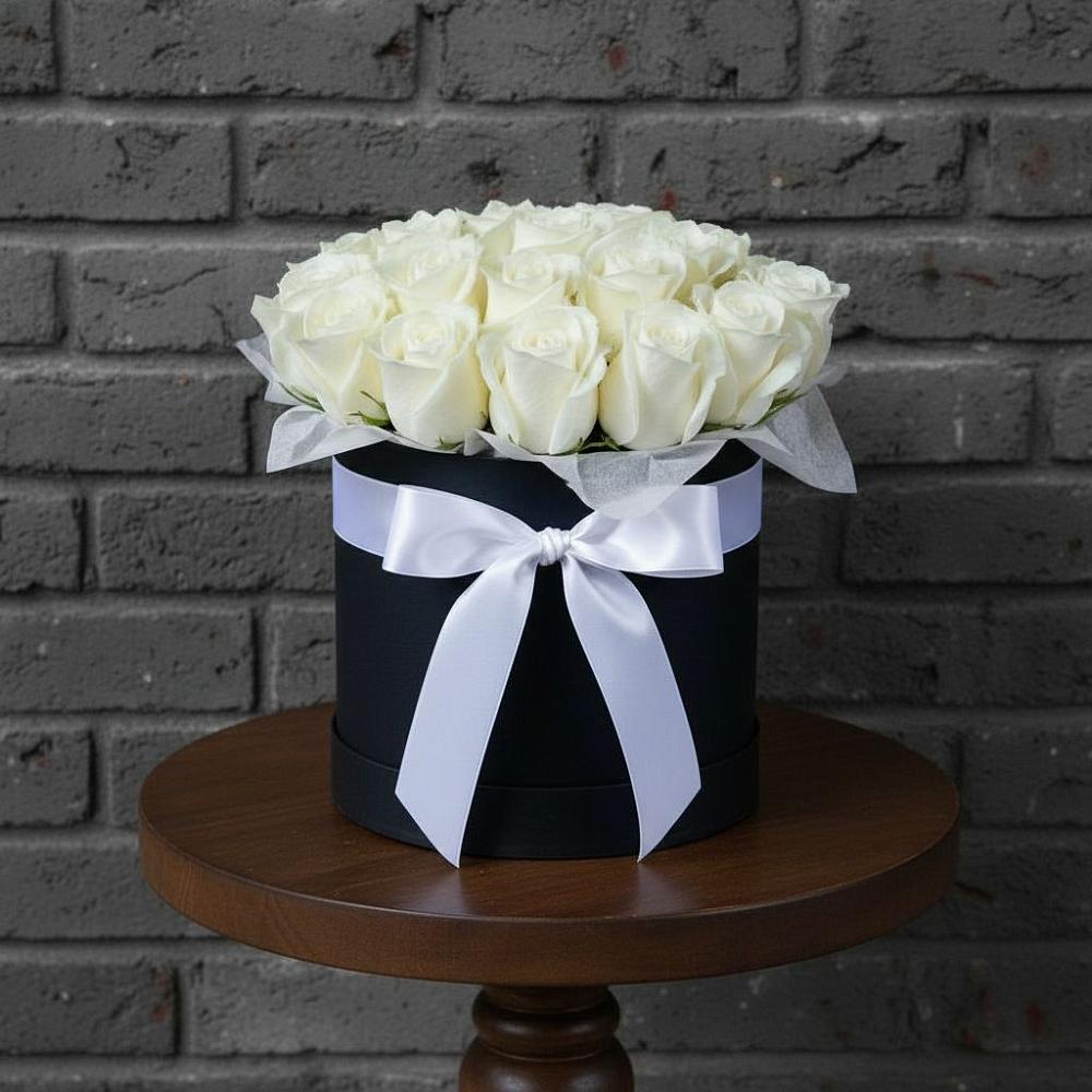 Цветочная композиция из Розы в шляпной коробке в Северка